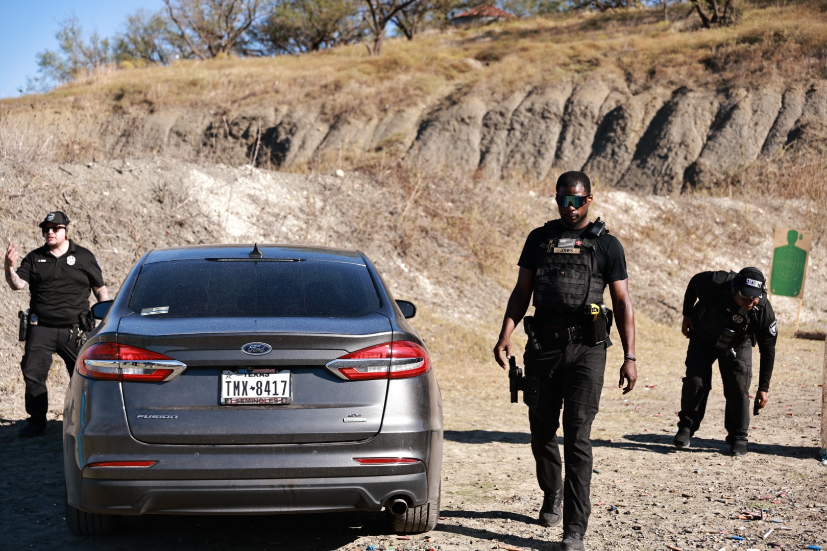 Officers performing tactical vehicle movement drill